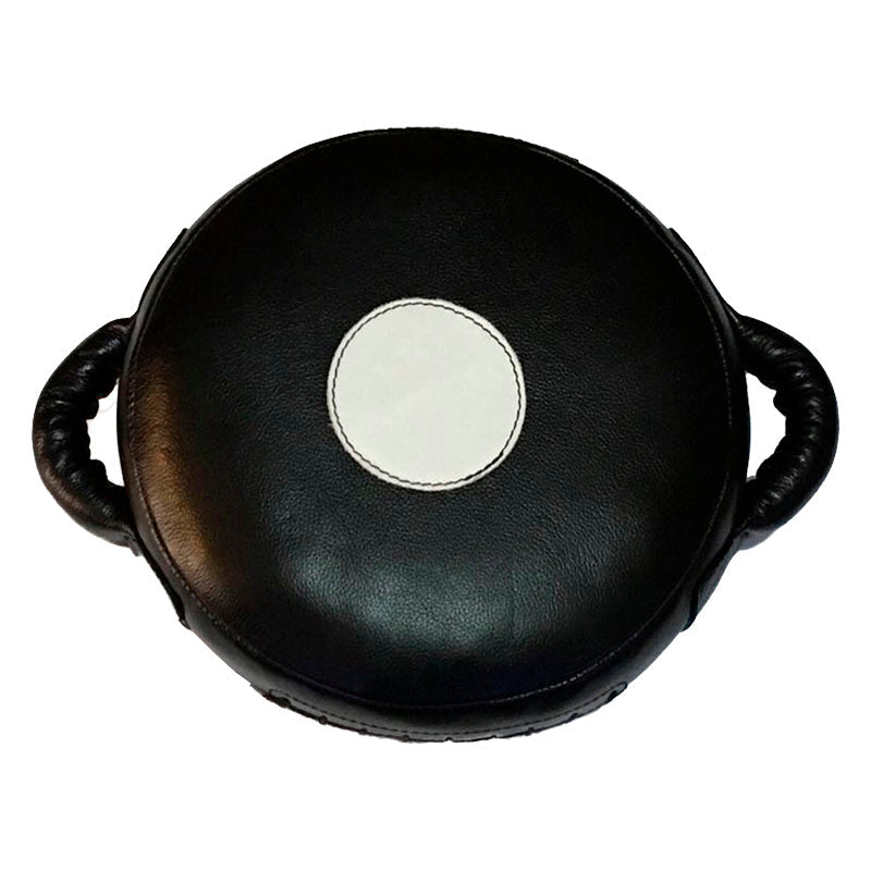 Punch round cushion in cow leather